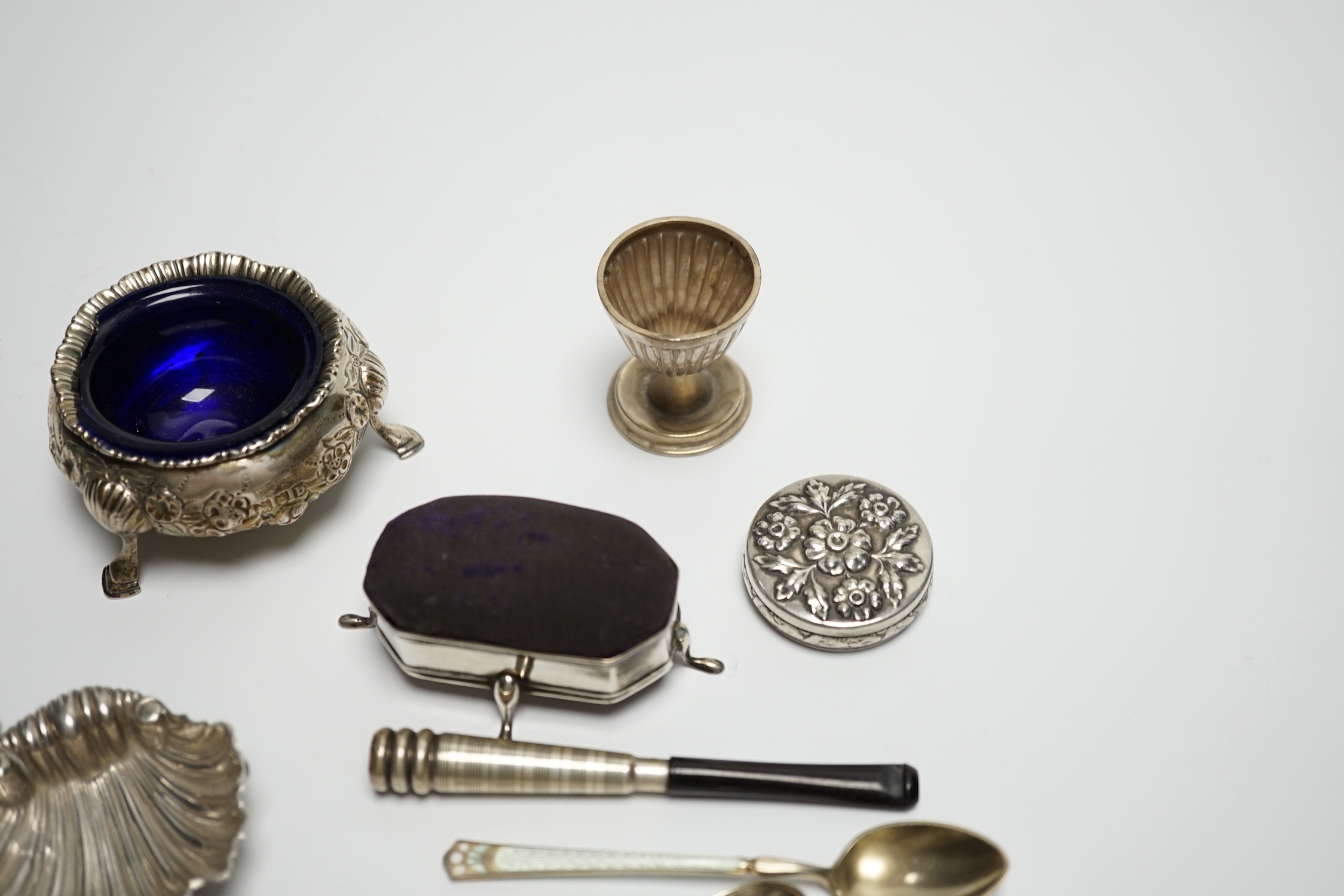 A late Victorian silver bun salt and other items including silver mounted pin cushion, silver shell salt, spoons etc.